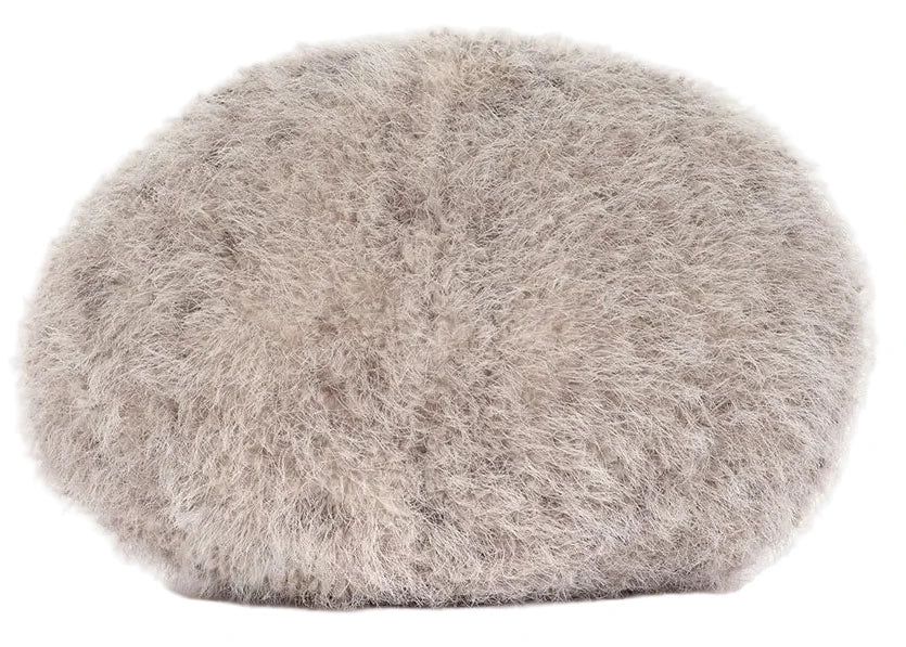 A light grey, fluffy Jellycat Amuseables Pebble beret hat made from soft, textured material—a dependable accessory displayed on a white background.