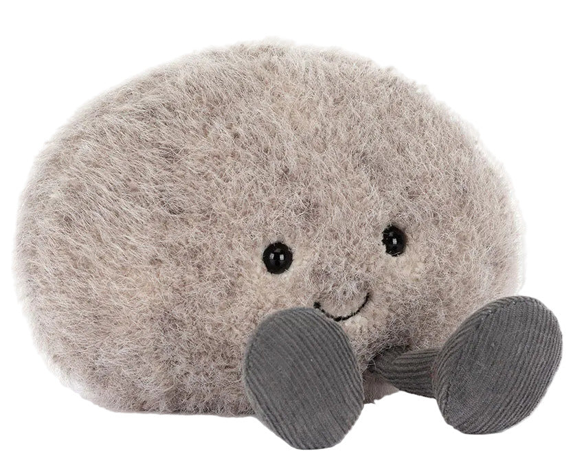 Amuseables Pebble by Jellycat is a plush toy shaped like a fluffy gray stone with black eyes, a stitched smile, and gray corduroy legs—perfect for cozy moments or playful adventures.