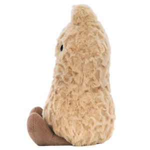 The Jellycat Amuseables Peanut is a plush with tan, shaggy fur, a soft beige shell, brown corduroy feet, and a small black eye. It sits upright and faces sideways.