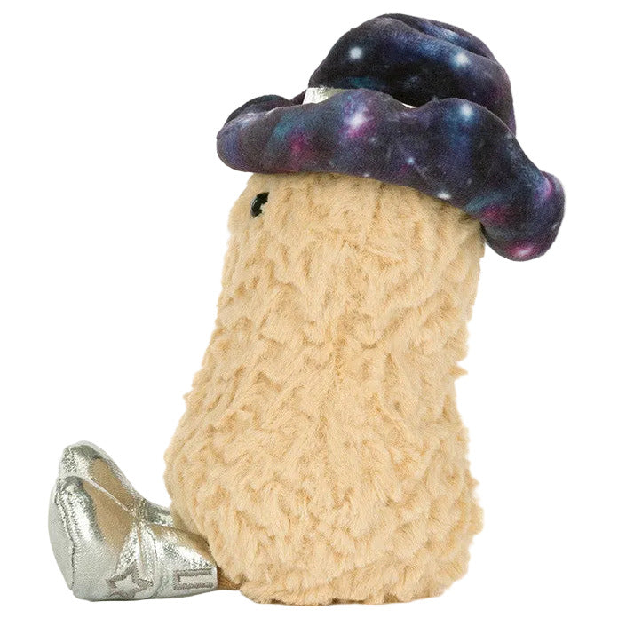 Jellycat Amuseables Peanut Space Rodeo Outfit plush toy sits upright with a fuzzy beige body, a purple galaxy-pattern hat, and shiny silver boots.