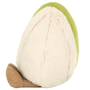 A plush toy by Jellycat called Amuseables Horatio Pistachio, shaped like a half-peeled pistachio with a light green shell, cream center, and brown stem—cute and cuddly for any plush collection.
