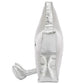 Side view of Jellycat Amuseables Silver Star, a plush toy with shiny silver fabric—showing one eye and a point—an adorable winter gift.