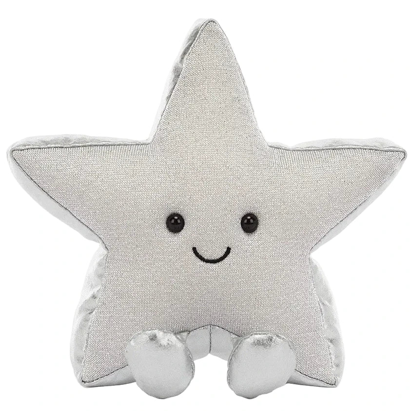The Jellycat Amuseables Silver Star plush pillow features black eyes and a smiling mouth—an adorable, cozy gift for winter.