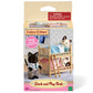 Box of Calico Critters Stack and Play Beds set, featuring adorable toy cats with bunk beds and dollhouse furniture accessories. Warning label notes small parts hazard for children under 3.