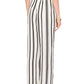 Someone wears the Elain Pant Monogram by Anine Bing—a high-waisted, wide-leg style in a lightweight cupro blend with ivory and black stripes—shown from the back.