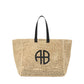 The Large Rio Tote by Anine Bing is woven in beige with black handles and a bold black AB monogram—an effortlessly stylish everyday essential.