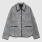 The Camden Jacket by Anine Bing is a men's casual gray and black plaid wool blend jacket with white buttons and black trim on the collar, pockets, and edges, shown on a plain background for a stylish everyday look.