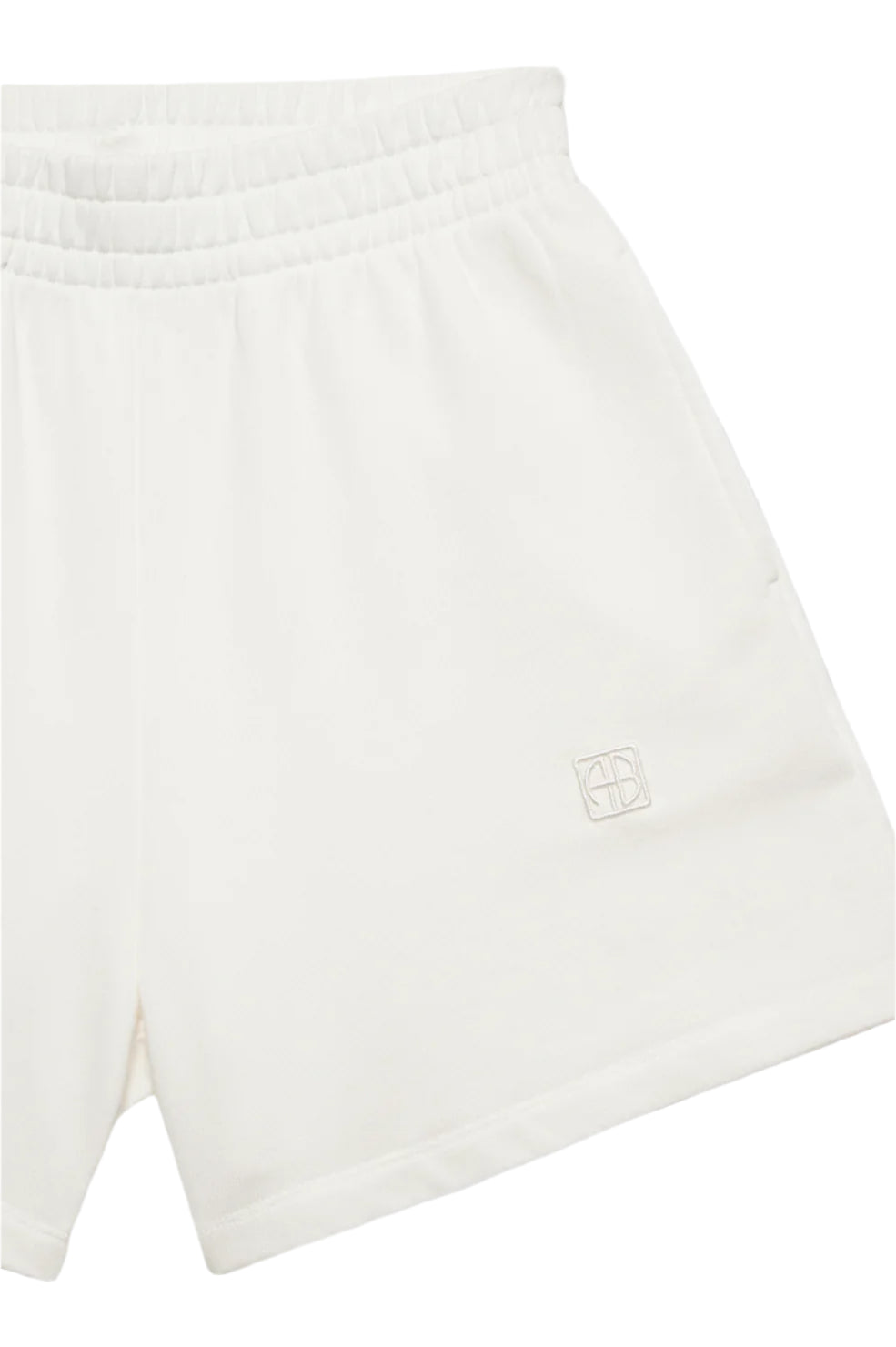 The Anine Bing Kam Short Framed Monogram shorts are white, made from midweight cotton with an elastic waistband and subtle logo embroidery on the left leg.