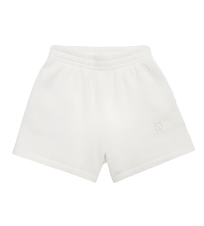 Anine Bing Kam Short Framed Monogram athletic shorts in soft midweight cotton feature an elastic waistband, side pockets, and a small embroidered logo on the lower left leg, shown against a plain background.