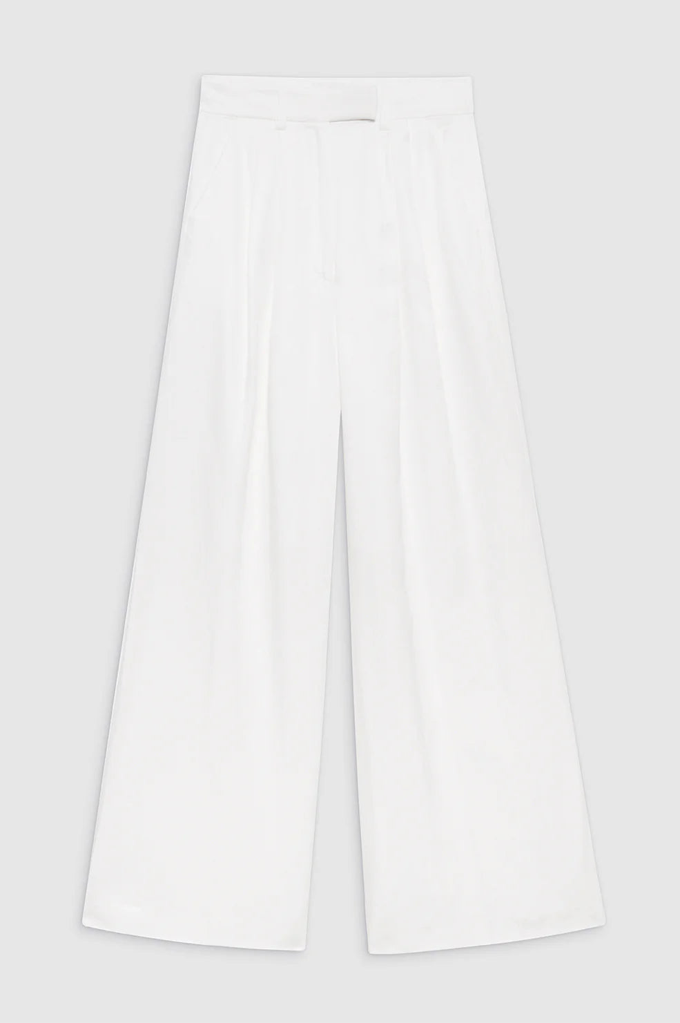 The Anine Bing Lou Trouser Linen is a wide-leg, high-waisted white pant made from a breathable linen blend with a flat front and flowy long legs, shown against a plain light grey background.