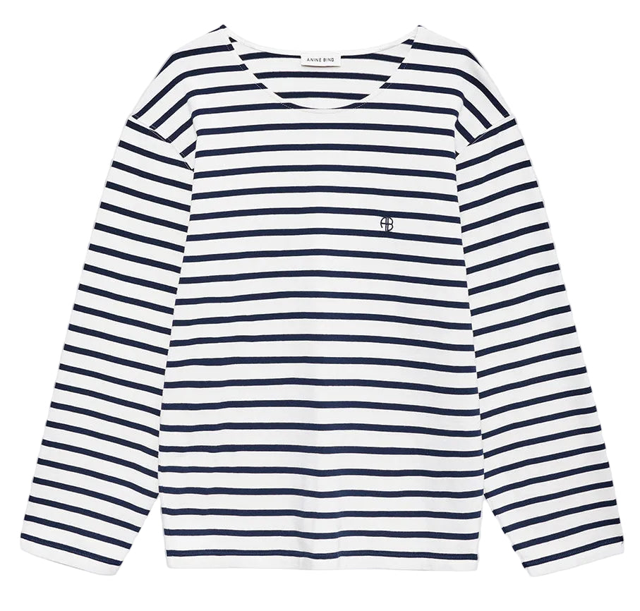 The Newton Tee by Anine Bing is a navy striped long sleeve shirt with a boat neckline, small embroidered emblem on the left chest, and a relaxed fit.