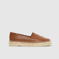 Anine Bing’s Paloma Espadrilles feature brown leather, a flat jute sole, and visible stitching, shown in a side view against a light background. Embrace effortless style with this chic design.