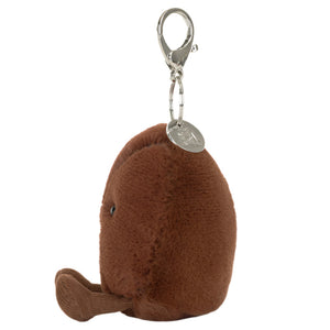 The Jellycat Amuseables Coffee Bean Bag Charm is a plush brown kiwi bird keychain with a metal clip, perfect as an adorable accessory for your bag.