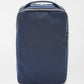 The Peter Millar Pursuit Shoe Bag is a navy blue rectangular travel bag with genuine leather trim, a top handle, and front zipper pocket, featuring a minimal design. Photographed against a plain white background.