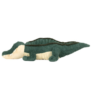 Allexi Alligator by Jellycat is a soft green and beige plush toy, inspired by vegan Southern eatery Gator’s Gap, shown lying flat on a white background.