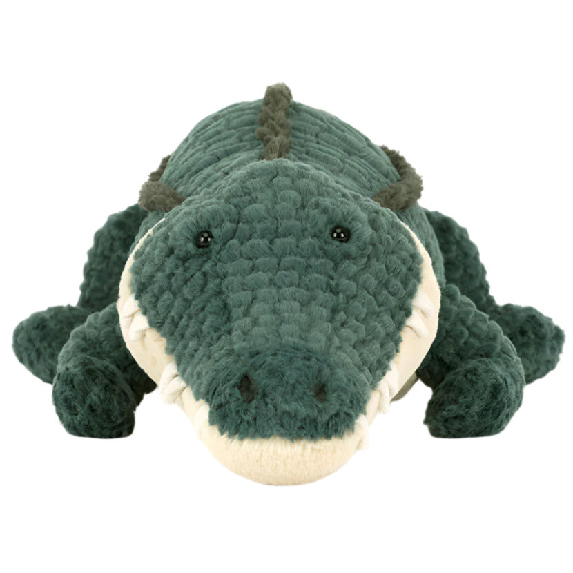 Meet Allexi Alligator by Jellycat—a green plush toy with textured fabric, lying flat and facing forward, inspired by the playful charm of Gator’s Gap diner.