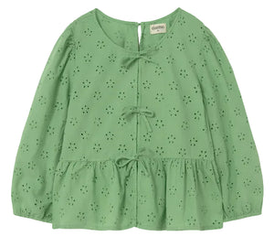 The Cozmo Girls' Alma Eyelet Blouse features a light green hue, long sleeves with delicate Swiss embroidery and eyelet details, three front bows, a round neckline, softly puffed sleeves, and a peplum hem.