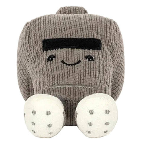 Plush toy shaped like a gray whistle with a smiling face, black eyebrows, and white feet with black dots, sitting upright against a white background—this adorable Jellycat creation is called the Amuseables Sports Walston Whistle and is part of the Amuseables Sports collection.