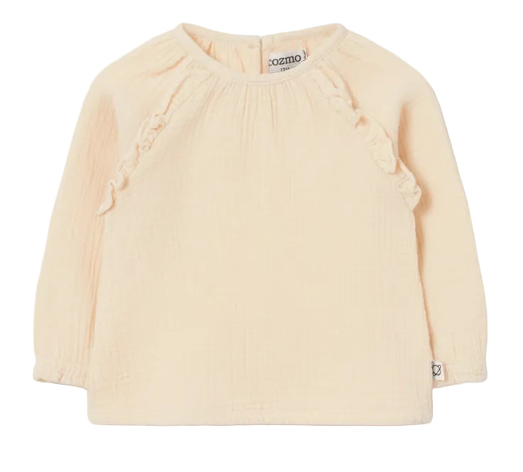 The Cozmo Baby Girls’ Anisa Blouse features long sleeves in a light beige hue, with delicate ruffle details on the shoulders and a round neckline. Made from textured cotton, the fabric is soft with a gentle crinkled finish.