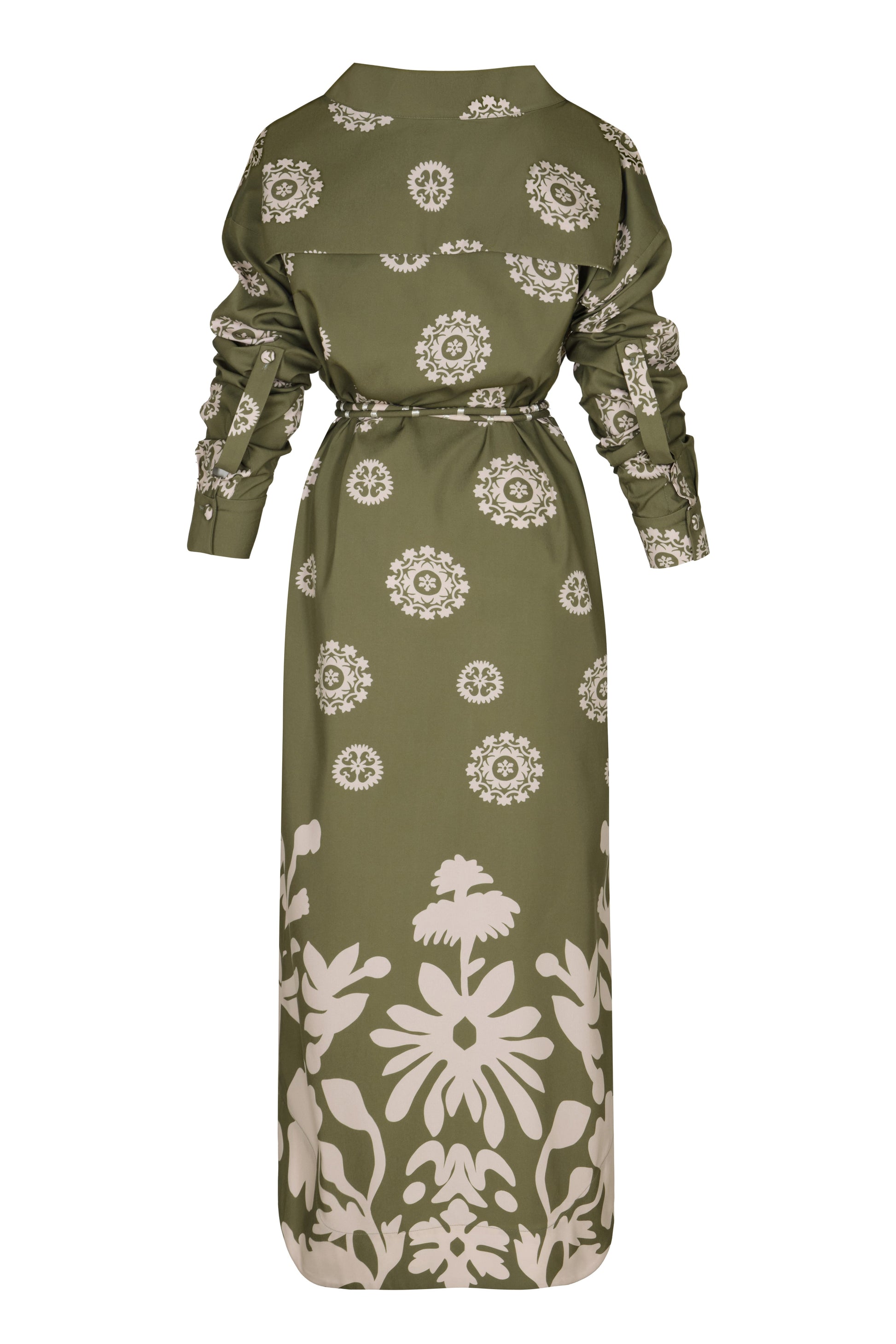 A long-sleeved, olive green and white print Andres Otalora Armenia Dress with floral patterns, buttoned cuffs, a waistband, and a collar, displayed from the back.