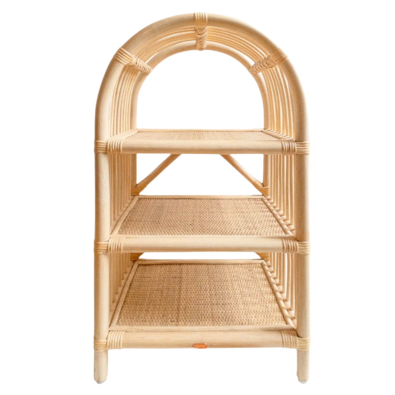 The Mini Rattan Shelf by Poppie is a three-tiered cabinet with an arched top and woven surfaces on each level, perfectly suited to complement Montessori-style play kitchens.