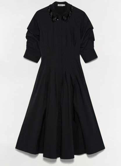 Simkhai Jazz Embellished Collar Midi Dress in black cotton poplin, featuring elbow-length sleeves, a button-down front, and a beaded fringe collar.
