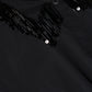 Close-up of a black Jazz Embellished Collar Midi Dress by Simkhai, featuring a collar with black bead and sequin fringe detailing.
