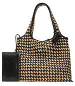 The 3.1 Phillip Lim Crochet Raffia Market Tote is a black and beige woven shopping bag featuring two handles, complemented by an attached black rectangular pouch with a slim strap.