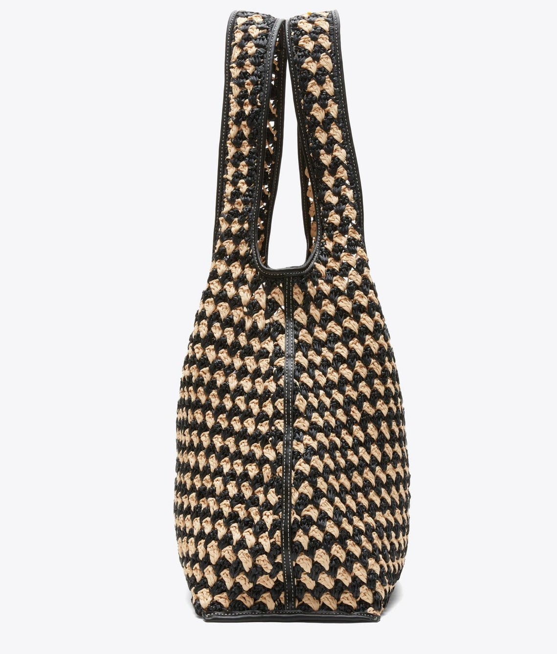 The Crochet Raffia Market Tote by 3.1 Phillip Lim features a black and beige geometric design, two handles, and a structured rectangular shape—making it the perfect stylish shopping tote for carrying your everyday essentials.