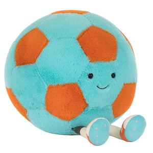 The Jellycat Football by Jellycat is a plush toy with blue and orange patches, a smiling face, and striped legs with feet—making it a fun soccer ball companion for kids.