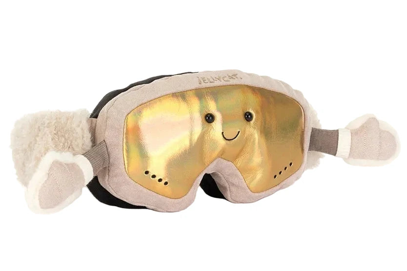 Jellycat Amuseables Sports Ski Club Goggles featuring a smiling face, shiny gold lens, and small plush arms with mittens.