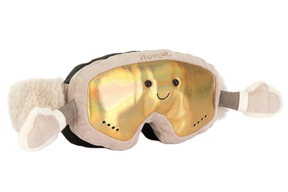 Jellycat Amuseables Sports Ski Club Goggles featuring a smiling face, shiny gold lens, and small plush arms with mittens.