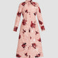 The Erdem Long Sleeve Abstract Rose Shirt Dress is a pink cotton poplin shirt dress with a collar, button-down front, and red abstract rose bouquets print, shown against a plain background.