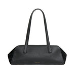 The Mansur Gavriel Helios Bag is rectangular, made of black leather, features two long shoulder straps, and has minimal gold branding at the bottom center.
