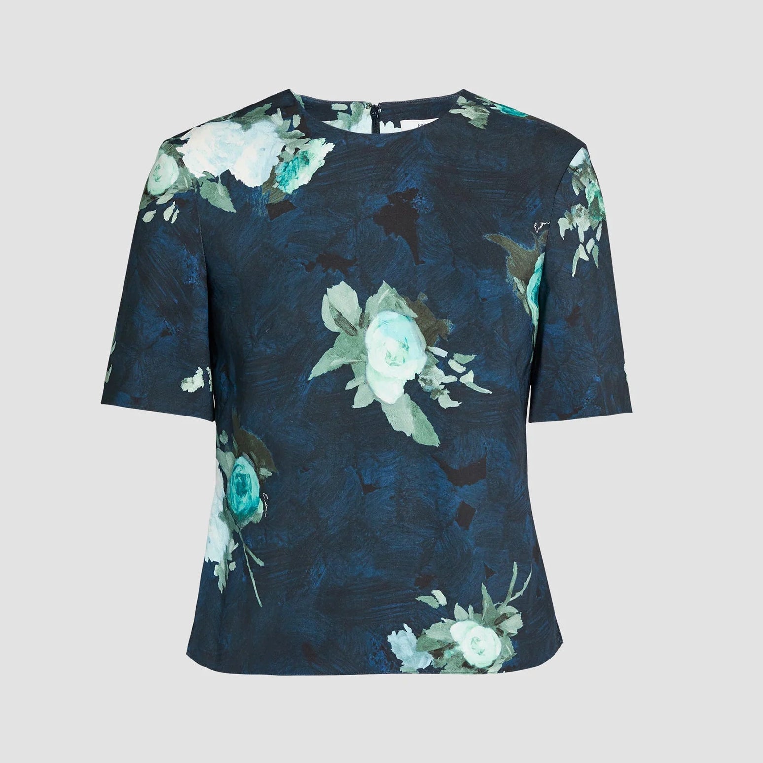 The Erdem Short Sleeve Abstract Rose Top features a round neckline, navy stretch-cady fabric, and a green and white abstract painted roses print.