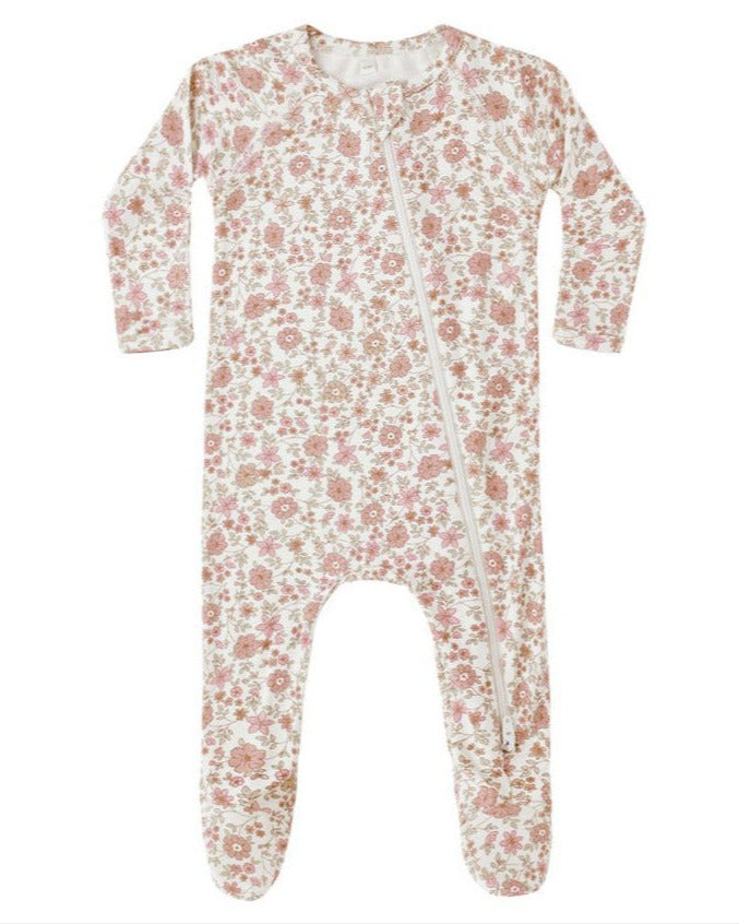 Soft and cozy, the Quincy Mae Baby Bamboo Zip Footie features a pink and beige floral print on white, with an asymmetrical double-zip design for easy changes.