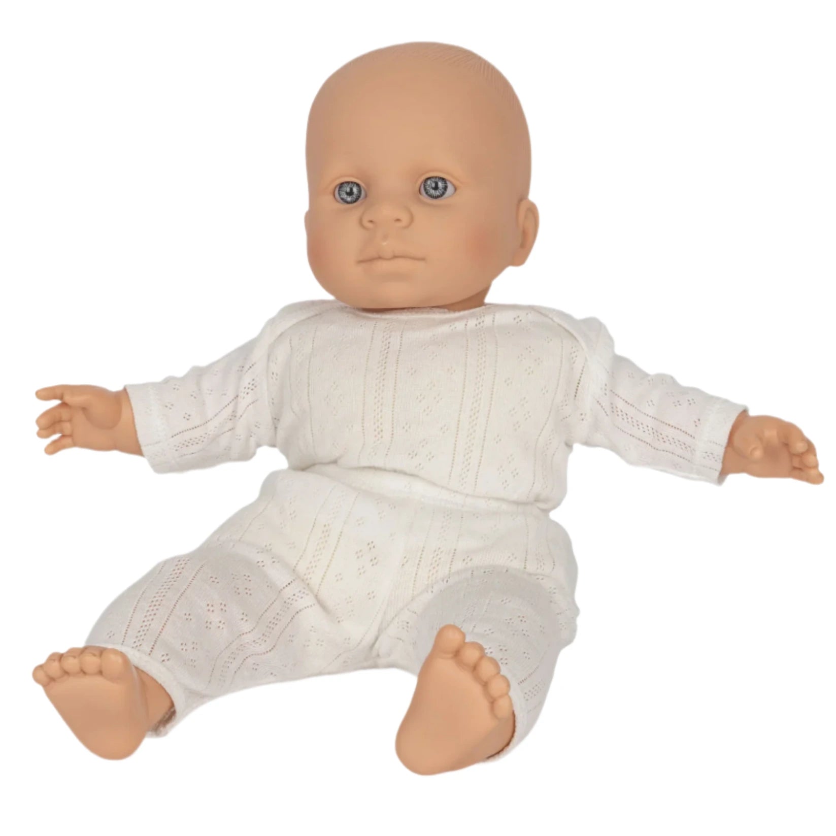 Konges Slojd Alfie the Doll, made from organic cotton by Konges Slojd, is dressed in a white textured outfit and is seated with arms outstretched and legs slightly apart.