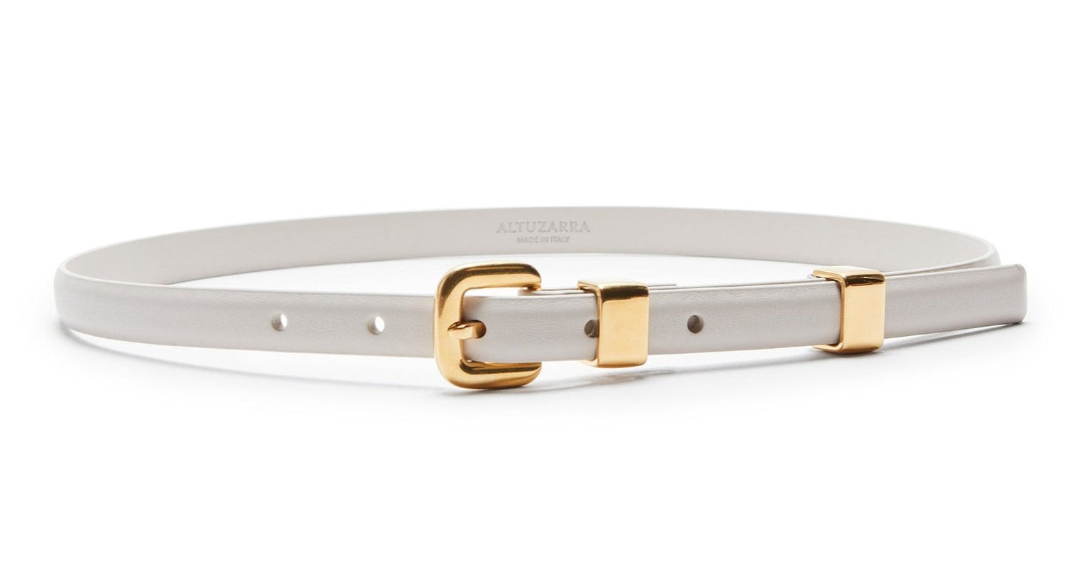 The Altuzarra Skinny Belt, made in Italy from white calf leather, showcases a gold buckle with two elegant gold loops, providing a stylish and sophisticated touch.