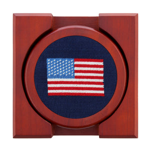 The American Flag Coasters by Smathers & Branson showcase a hand-stitched United States flag set against a dark blue background on wood, bringing classic charm to any table setting. Ideal for needlepoint coaster enthusiasts, these coasters can be elegantly paired with a wooden coaster holder for a stylish and organized display.