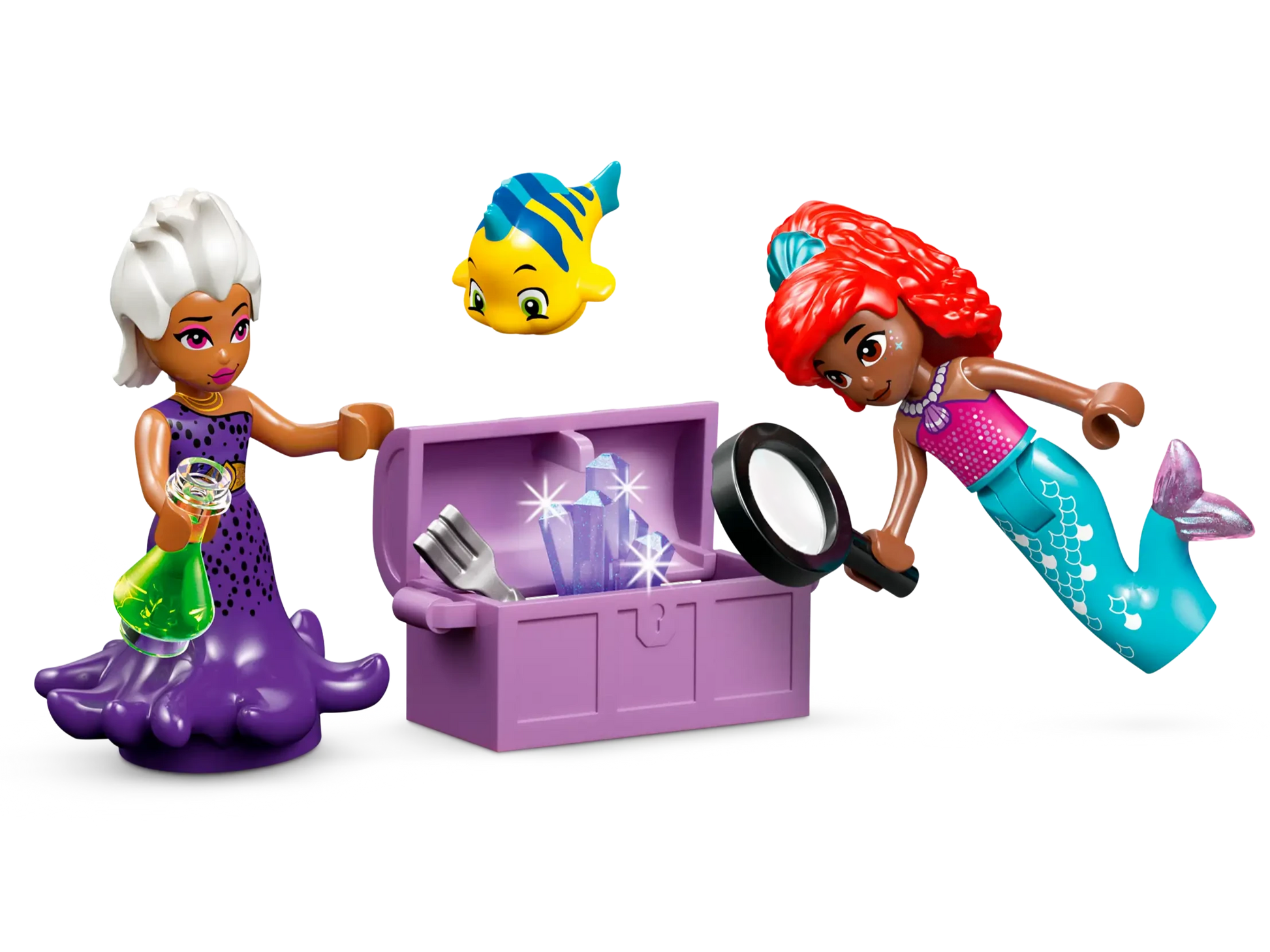 In the LEGO® Disney™ Ariel's Crystal Cavern playset from Legos - Toyhouse, two LEGO figures explore a treasure chest. One of the figures is holding a magnifying glass, while a small fish hovers above. The chest features translucent purple gems reminiscent of Ariel's adventures.