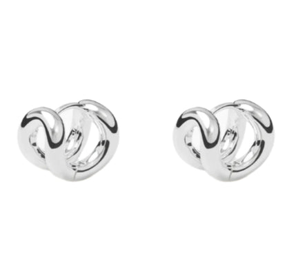 The Asta Earrings by Lie Studio feature a refined silhouette in polished sterling silver, elegantly displayed on a white background.