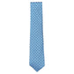 The Atomic Diamond Tie by Robert Jensen is a light blue silk tie with a dark blue geometric pattern and hand-stitched details, shown on a white background.