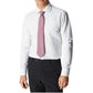 A man is shown from shoulders to waist against a plain background, wearing a white dress shirt, black trousers, and the Robert Jensen Atomic Diamond Tie in pink patterns.