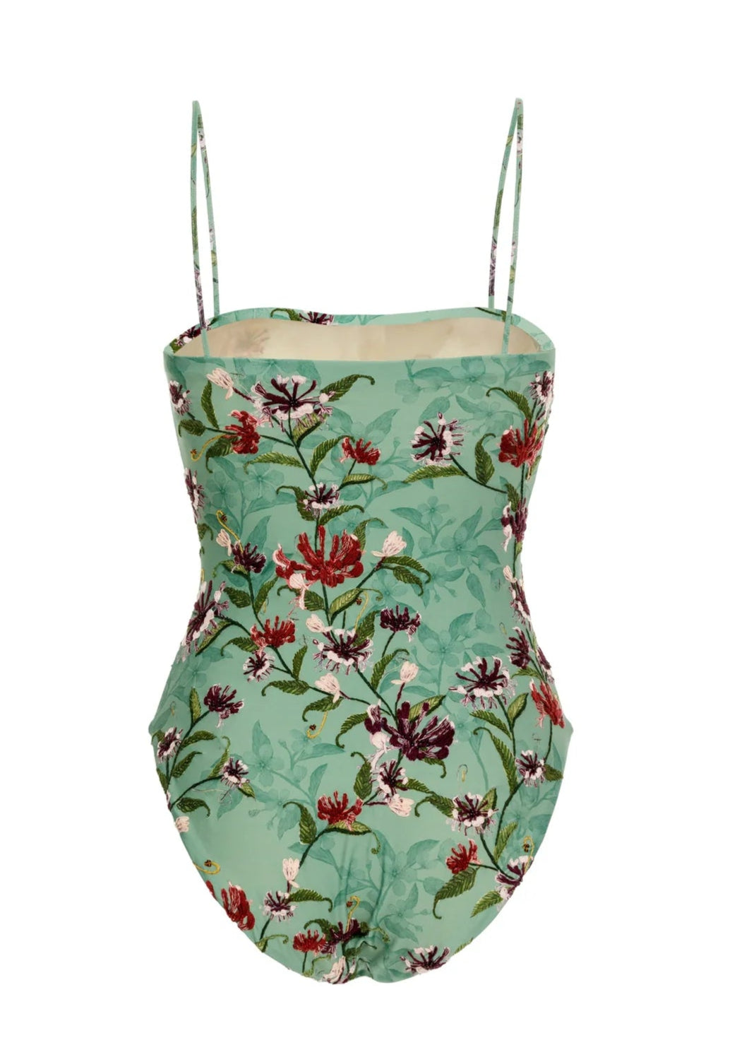 The Durazno One Piece by Agua By Aguabendita is a teal swimsuit with thin straps, crafted from recycled polyester and adorned with a multicolored floral print. It features built-in UPF 50 sun protection for stylish comfort on sunny days.