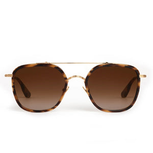 Front view of Krewe Austin Sunglasses featuring tortoiseshell frames, brown gradient lenses, and a slim gold metal double bridge—crafted to suit many flattering face shapes.