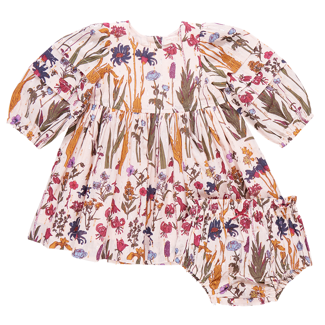 The Pink Chicken Baby Girls' Brooke Dress Set features long sleeves and vibrant autumn floral prints, complete with matching bloomers.