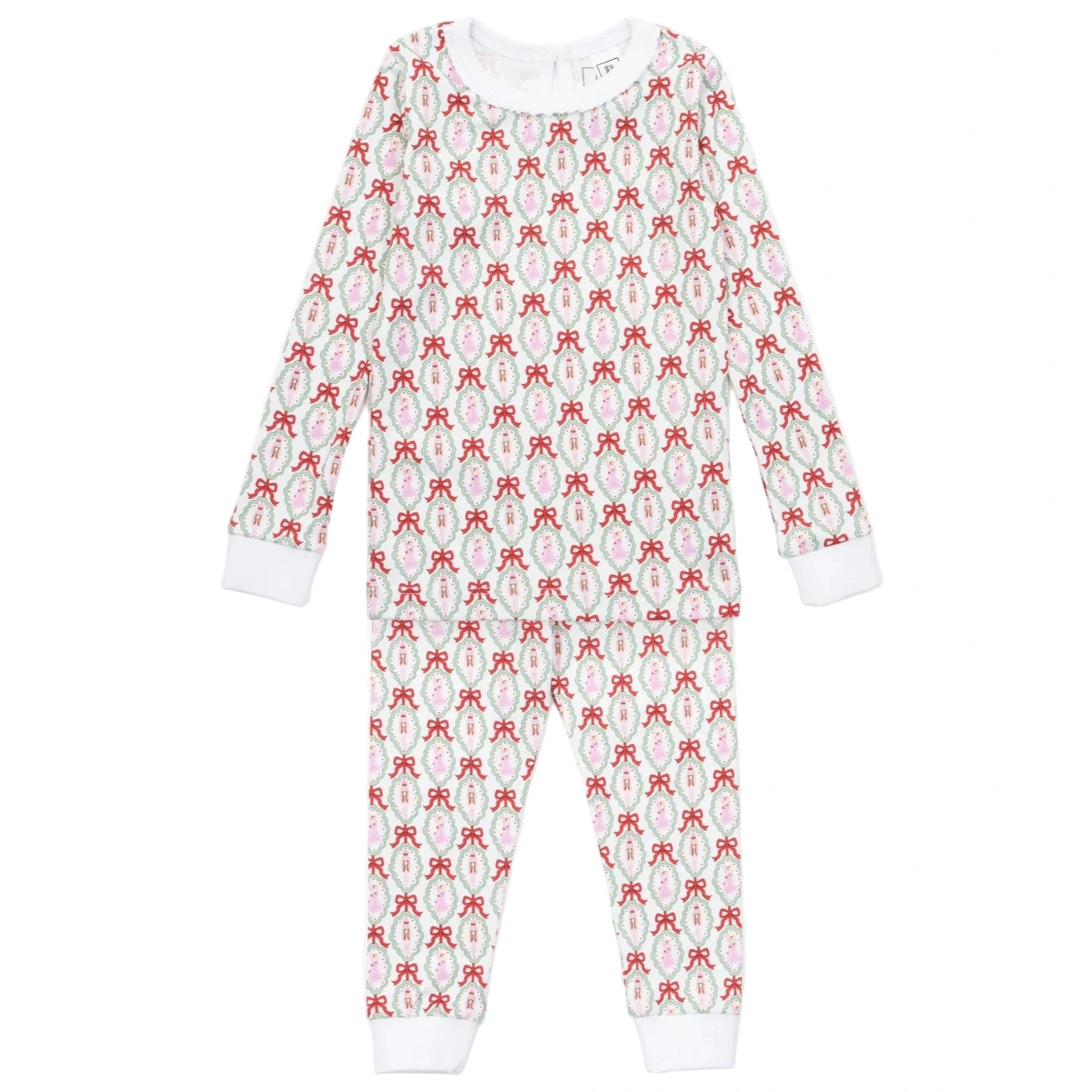 The Girls' Ava Pajama Pant Set by Lila & Hayes is a long-sleeve, full-length Peruvian cotton set with a red bow pattern on white and white cuffs at the wrists and ankles.