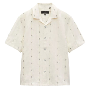 The Avery Embroidered Camp Shirt by Rag & Bone is a short-sleeve, button-up cream camp shirt with a notched collar, subtle vertical stripes, and geometric motifs—crafted from a cotton-linen blend for effortless summer style.