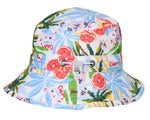 The Snapper Rock Ciao Paradiso Bucket Hat is a colorful kids hat with a tropical palm and grapefruit print, "Ciao" in red, an adjustable white drawstring, and UPF50+ fabric for superior sun protection.
