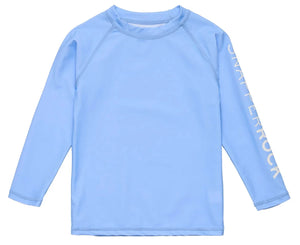 The Boys' LS Rash Top by Snapper Rock is a light blue long-sleeve rashguard with "SNAPPER ROCK" in white on the left sleeve, designed for sun safety and shown on a white background.
